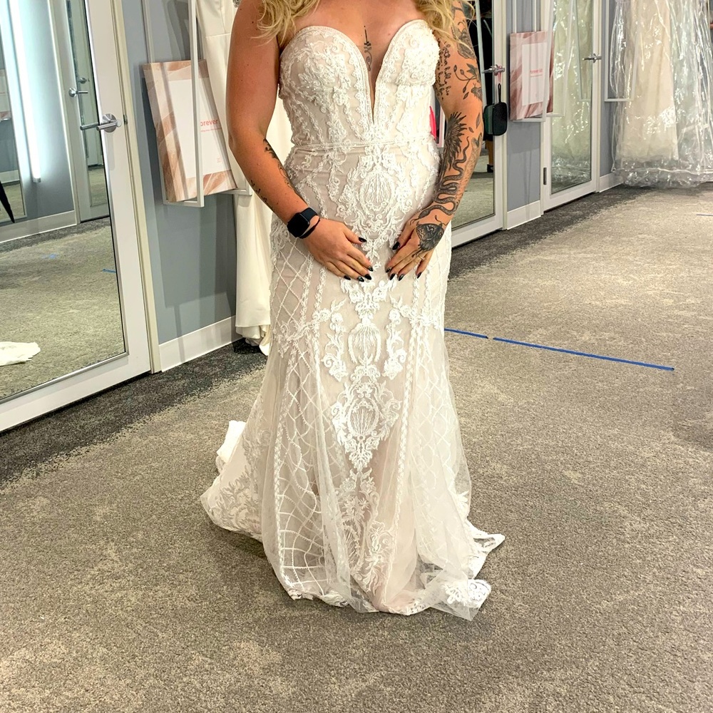 Never worn, never altered wedding dress